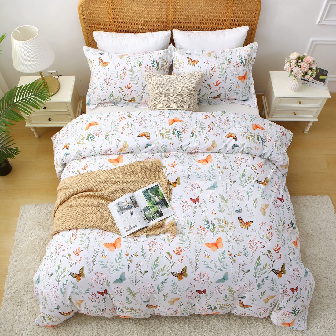 Overhead view of the Butterfly botanical comforter lying smooth and even across the bed, showing its lightly quilted cloud-soft fill